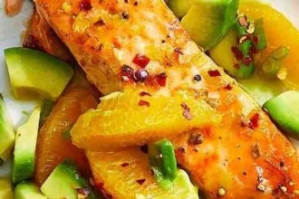 Air-Fryer Salmon recipe with Avocado Salsa served on a plate