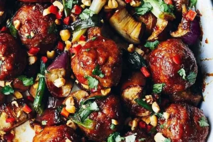 Delicious Asian-inspired eggplant casserole served in a bowl with toppings.