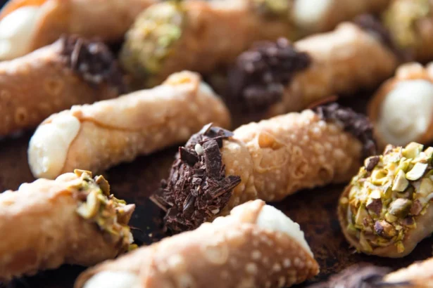 Delicious homemade cannoli filled with sweet ricotta cream and chocolate chips