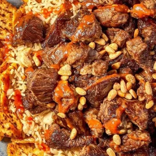 Delicious Egyptian Beef served with Pita bread and Rice