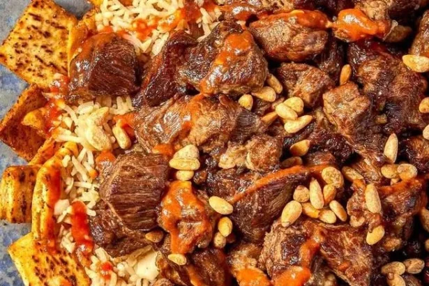Delicious Egyptian Beef served with Pita bread and Rice