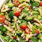 Greek Broccoli Pasta Salad with colorful vegetables and pasta