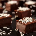 Delicious bowl of homemade microwave fudge with chocolate and nuts