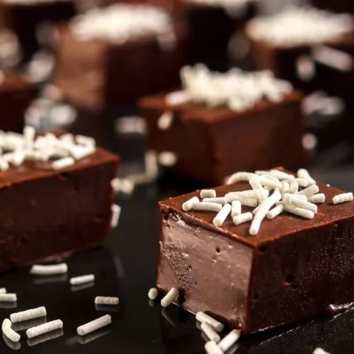 Delicious bowl of homemade microwave fudge with chocolate and nuts