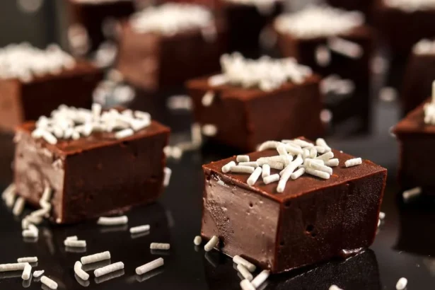 Delicious bowl of homemade microwave fudge with chocolate and nuts