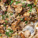 Delicious mushroom casserole dish with creamy sauce and herbs