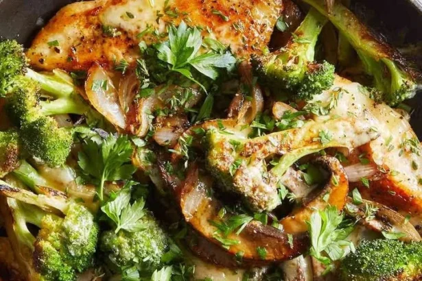 Mushroom topped chicken cutlets served on a plate with herbs and spices