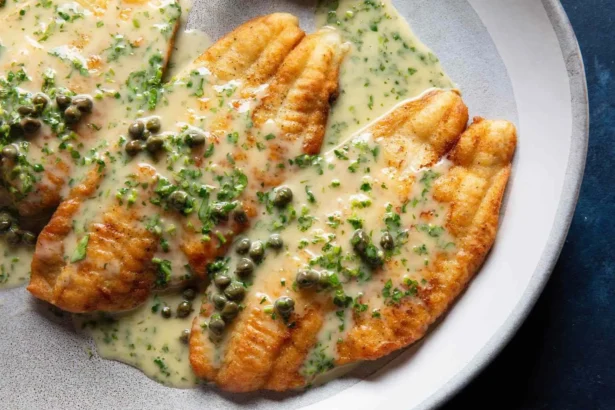 Pan-fried fish fillets served with a lemon-butter sauce