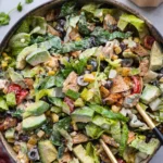 Colorful Santa Fe Salad with vegetables, beans, and dressing