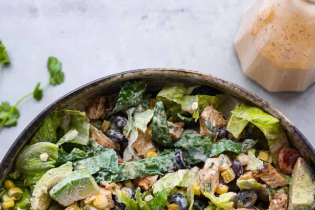 Colorful Santa Fe Salad with vegetables, beans, and dressing