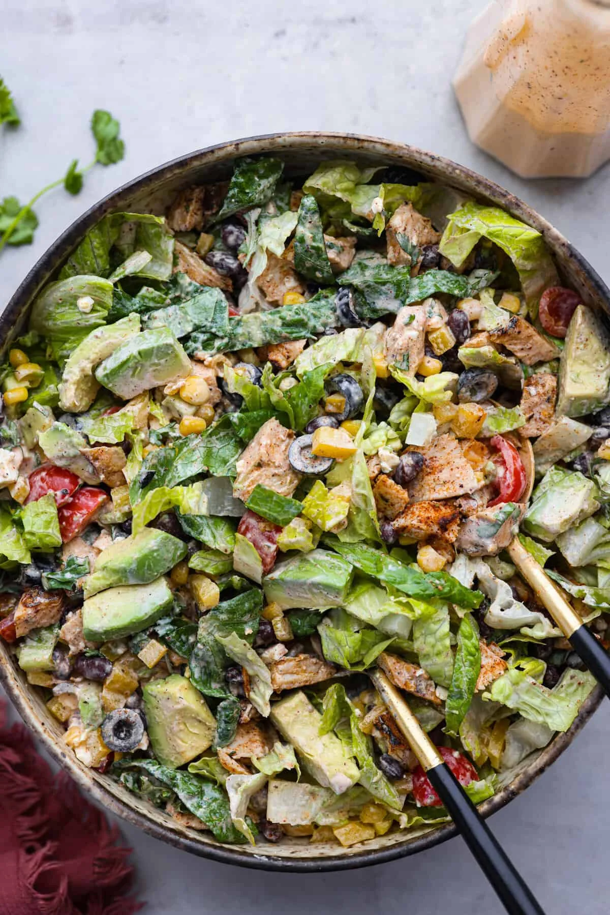Colorful Santa Fe Salad with vegetables, beans, and dressing
