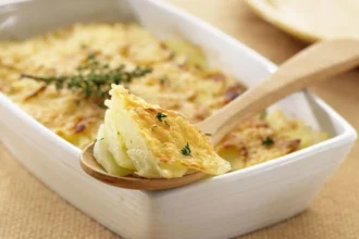 Savoyard Potatoes baked with cheese and herbs, showcasing a delicious French dish.
