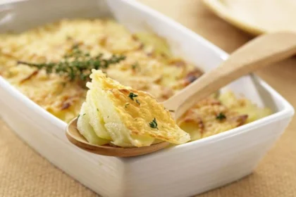 Savoyard Potatoes baked with cheese and herbs, showcasing a delicious French dish.
