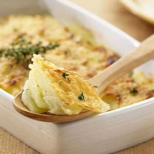 Savoyard Potatoes baked with cheese and herbs, showcasing a delicious French dish.