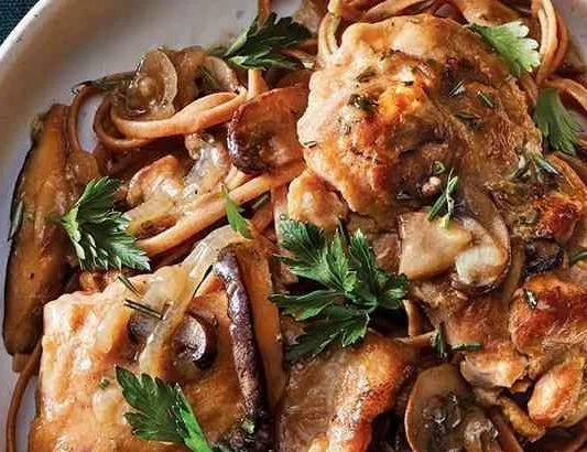 Slow-cooker chicken dinner with vegetables and herbs.
