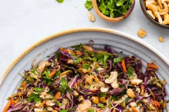 Delicious Thai Chicken Salad with fresh vegetables and chicken on a plate.