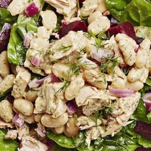 Tuna Salad with Cannellini Beans served in a bowl, healthy and vibrant dish
