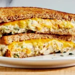 Tuna melt sandwich with white beans on toasted bread