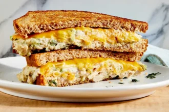 Tuna melt sandwich with white beans on toasted bread