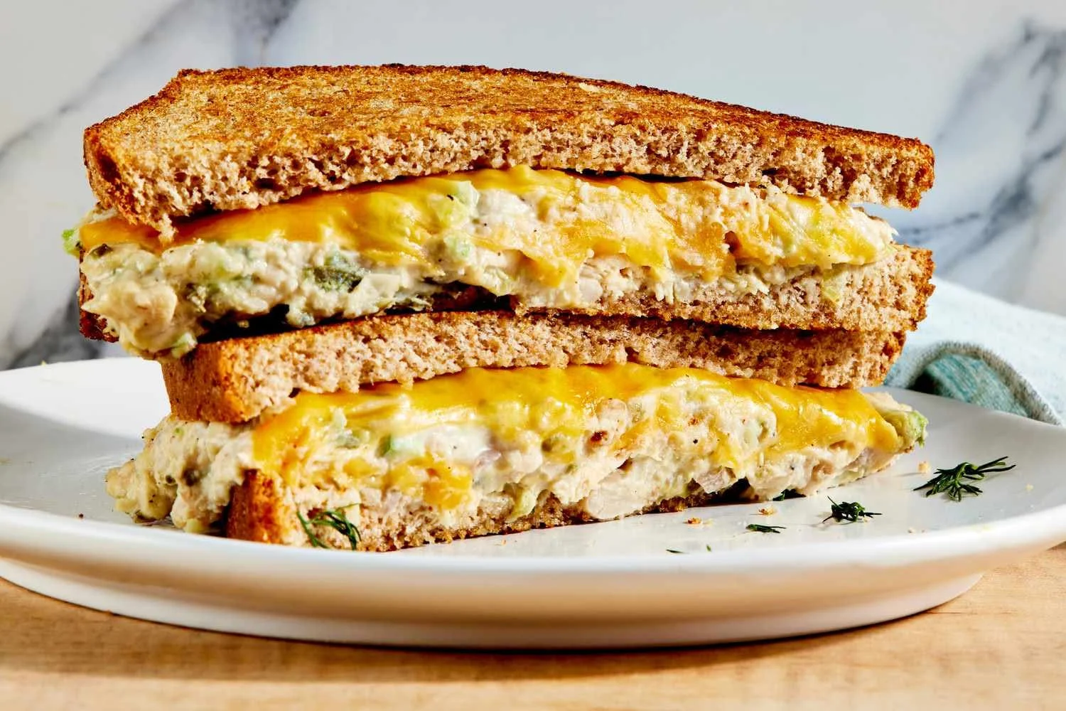 Tuna melt sandwich with white beans on toasted bread