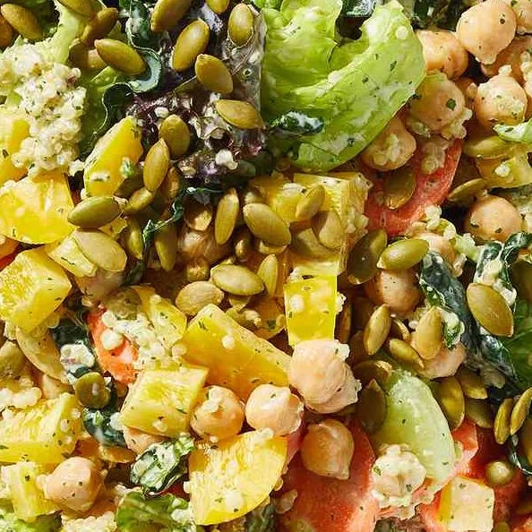 Vegetarian chopped power salad with creamy cilantro dressing and colorful veggies