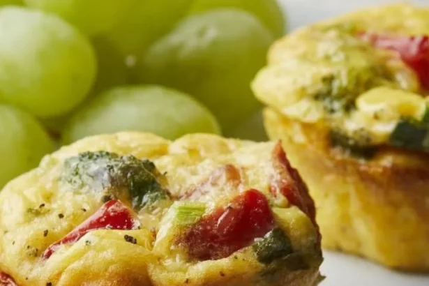 Muffin-tin veggie omelets baked with a variety of fresh vegetables