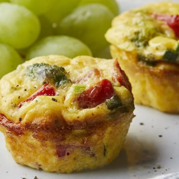 Muffin-tin veggie omelets baked with a variety of fresh vegetables