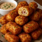 Crispy Reuben-Style Tater Tots with bacon and sauerkraut, plated for serving.