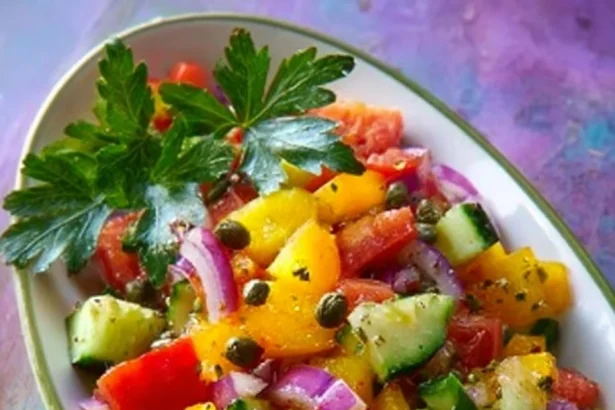 Cucumber salad with dill vinaigrette served in a bowl