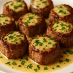 Delicious steak bites served with garlic butter and creamy parmesan