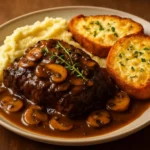 French Onion Braised Beef with Mushrooms served on a plate