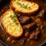 Delicious French onion short rib soup topped with cheesy Gruyère toast.