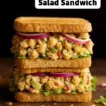 Chickpea Tahini Salad Sandwich with fresh vegetables and tahini dressing