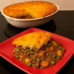 Delicious Cottage Pie served in a rustic dish, showcasing layers of meat and mashed potatoes.