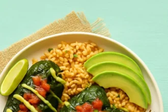 Colorful vegan stuffed peppers filled with quinoa and vegetables