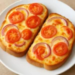 A delicious breakfast plate shared by Mark featuring eggs, toast, and fresh fruit.
