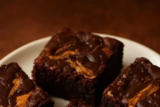 Delicious Peanut Butter Swirl Brownies topped with creamy peanut butter swirls