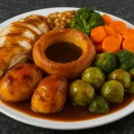 Deliciously roasted chicken dinner served with sides.