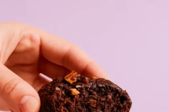 Delicious salted chocolate banana nut muffins fresh out of the oven.