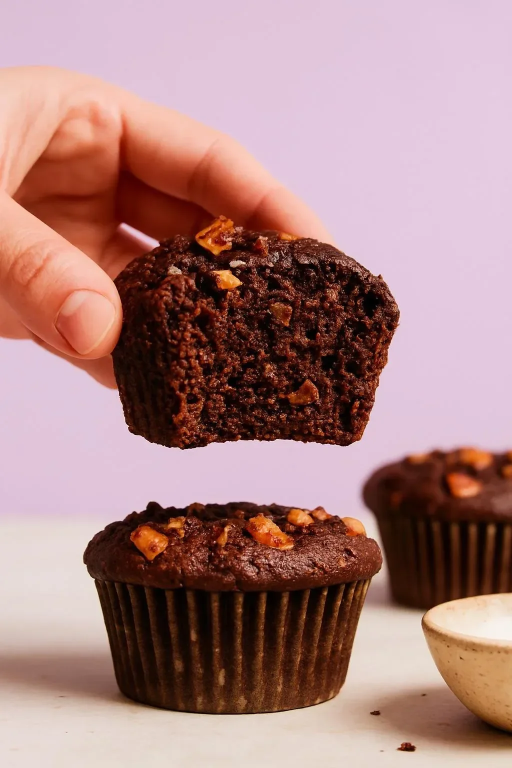 Delicious salted chocolate banana nut muffins fresh out of the oven.