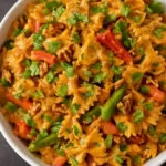 Tikka Masala Pasta Salad with colorful vegetables and spices