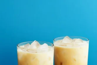 Glass of Vegan Thai Iced Tea with coconut milk and spices