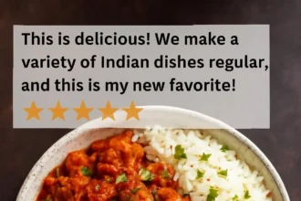 A colorful bowl of Vegetable Balti, showcasing a variety of spices and fresh vegetables.