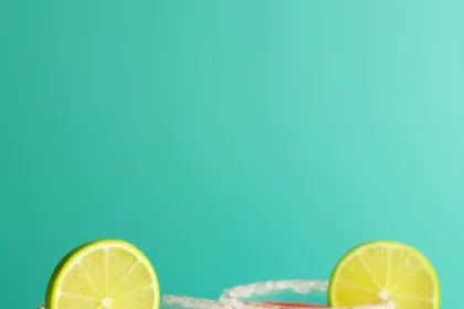 Refreshing watermelon margaritas in a glass with lime garnish