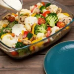 Cheesy baked vegetable casserole with colorful vegetables and melted cheese