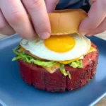 Delicious smoked bologna on a cutting board with spices