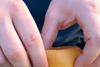 Delicious smoked bologna on a cutting board with spices