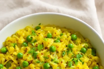 A bowl of Instant Pot Indian Cabbage and Peas, showcasing vibrant colors and healthy ingredients.
