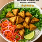 Delicious Vietnamese curried tofu noodle bowl with vibrant colors and textures