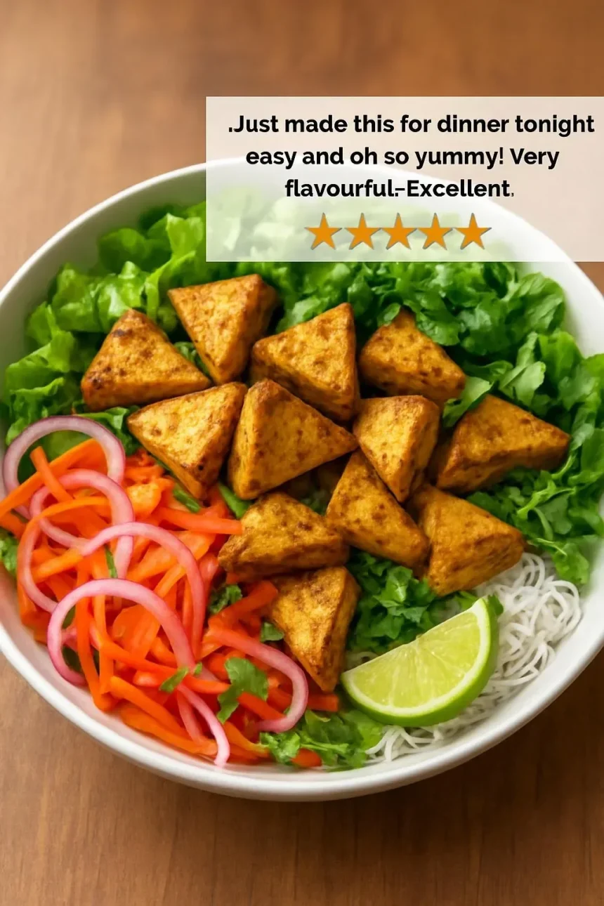 Delicious Vietnamese curried tofu noodle bowl with vibrant colors and textures